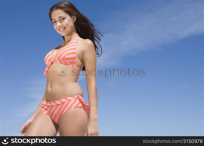 Young woman in a two piece bathing suit