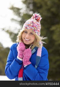 Young Woman In Alpine Snow Scene