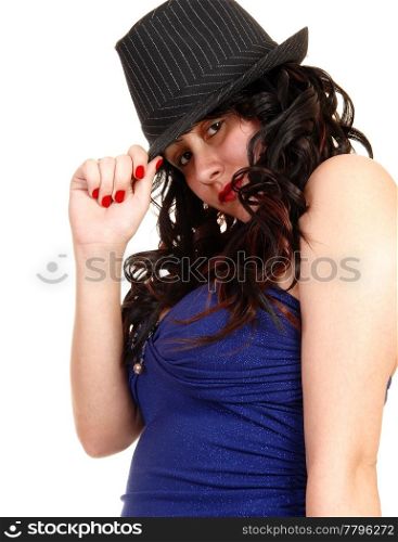 Young woman in an blue top and long black curly hair and a gray hatstanding for white background.