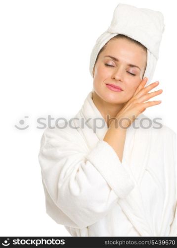 Young woman in bathrobe enjoying freshness