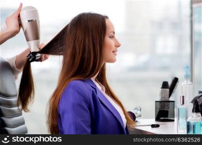 Young woman in beauty salon