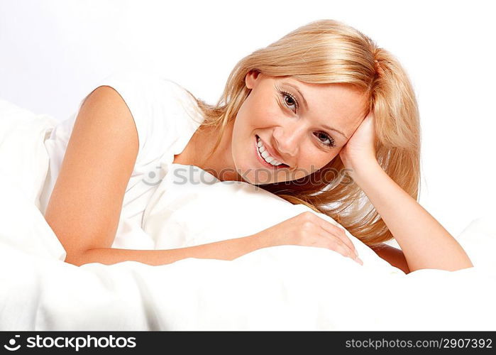 Young woman in bed.