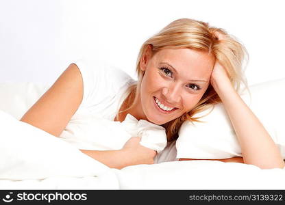 Young woman in bed.