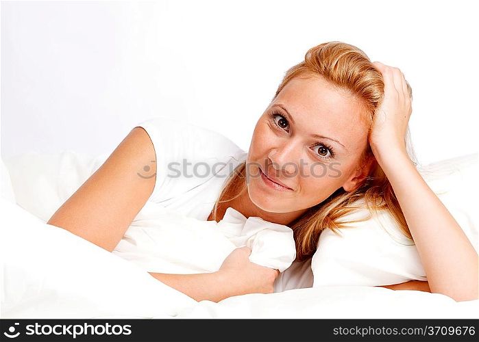 Young woman in bed.