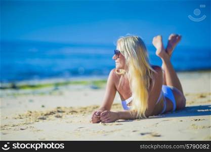 Young Woman in Bikini on a Tropical Sand Beachreleased