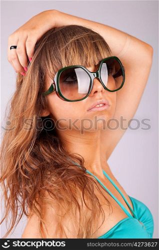 Young woman in bikini - posing isolated