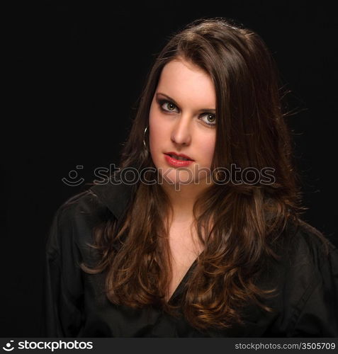 Young woman in black shirt fashion portrait brunette model