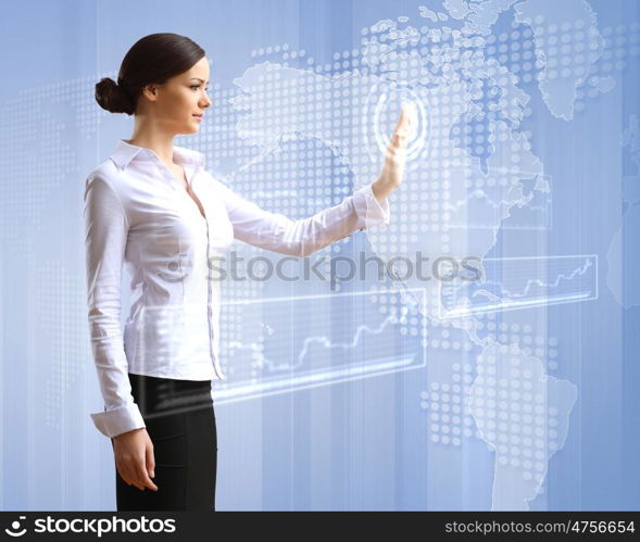 Young woman in business wear with touchscreen technology background