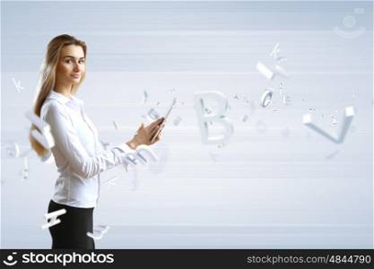 Young woman in business wear with touchscreen technology background