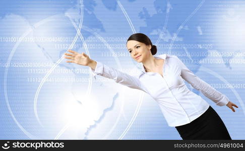 Young woman in business wear with touchscreen technology background