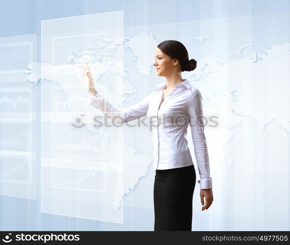 Young woman in business wear with touchscreen technology background