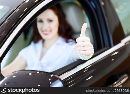 Young woman in car