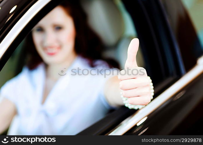 Young woman in car