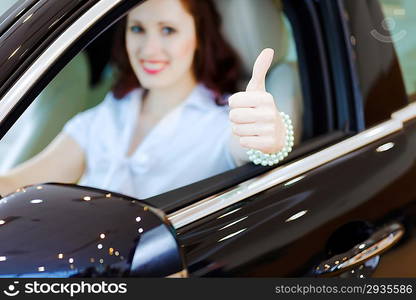 Young woman in car