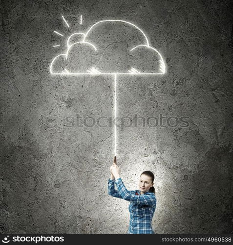 Young woman in casual holding cloud on lead. Weather concept