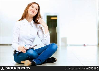 Young woman in casual. Image of young red hair woman in casual wear