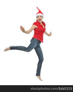 Young woman in Christmas hat jumping