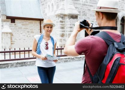 Young woman in city posing for a photo. Young woman posing for a photo