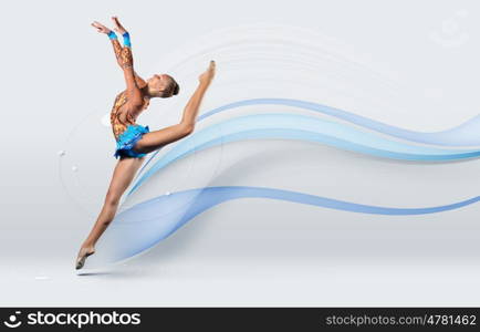 Young woman in gymnast suit posing. Young cute woman in gymnast suit show athletic skill on white background