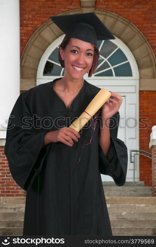 Young woman in her graduation robes