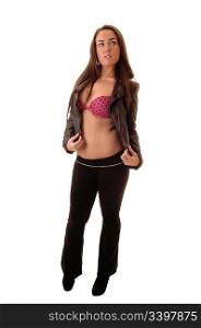 Young woman in long pants, red bra and leather jacket standing in thestudio, showing her nice figure, for white background.