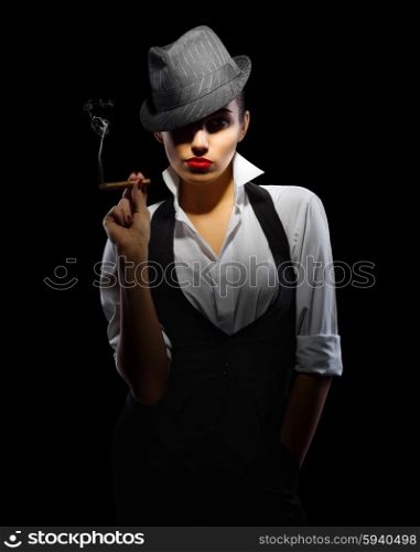 Young woman in manly style with cigar isolated