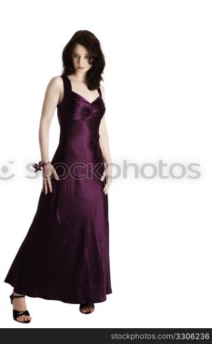 young woman in purple evening dress. young beautiful woman standing in purple evening dress