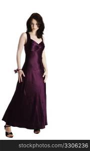 young woman in purple evening dress. young beautiful woman standing in purple evening dress