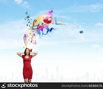 Young woman in red dress closing ears with palms