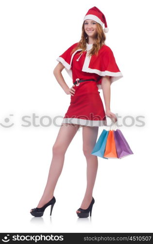 Young woman in red santa costume on white