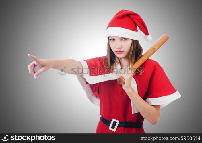 Young woman in red santa costume on white