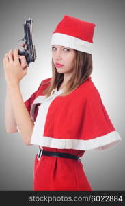 Young woman in red santa costume on white