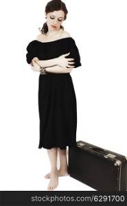 young woman in retro style with old suitcase isolated on white background