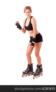 Young woman in rollerskates - fitness concept