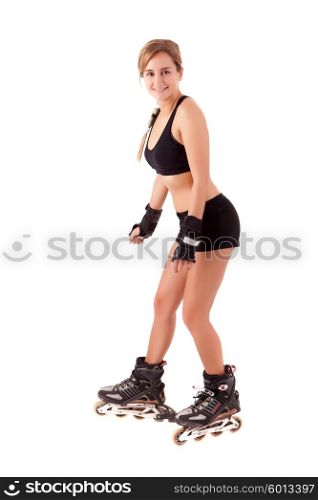 Young woman in rollerskates - fitness concept