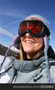 Young woman in ski goggles