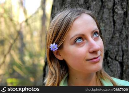 young woman in spring forest