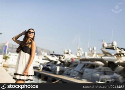 Young woman in the marina