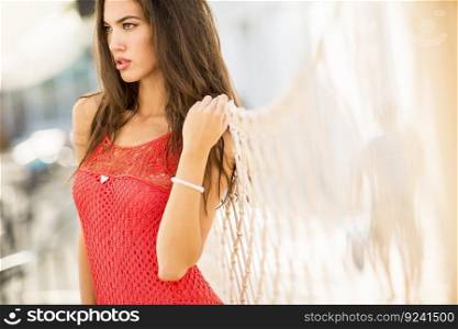 Young woman in the red dress