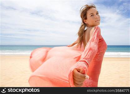 Young Woman in Wrap at Beach