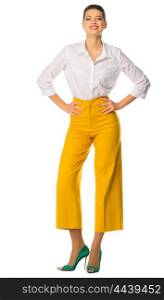 Young woman in yellow pants isolated
