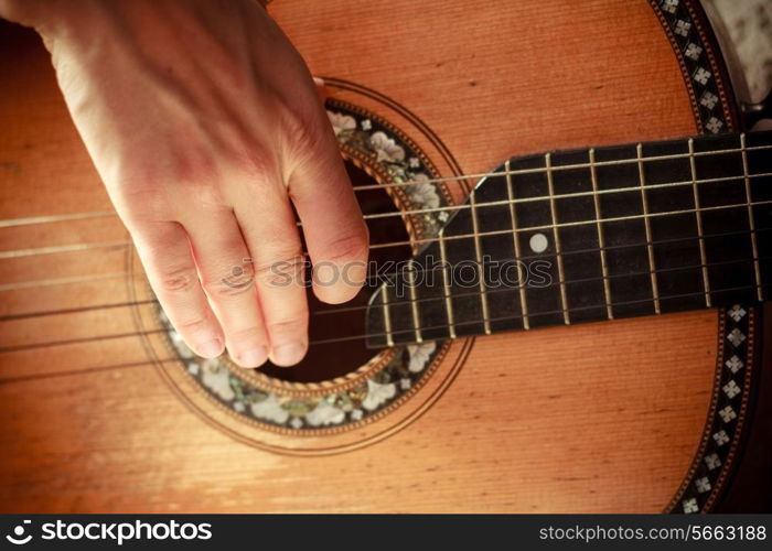 Young woman is playing guitar