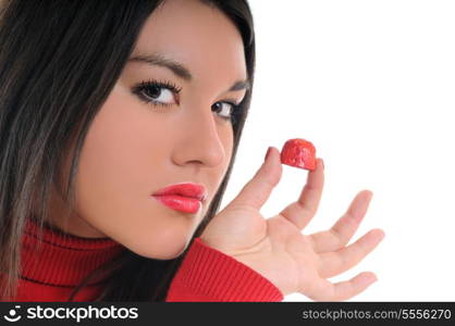 young woman isolated on white in red shirt eat sweet tasty chocolate