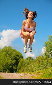 Young woman jumping