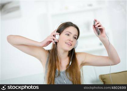 young woman listening to her mp3