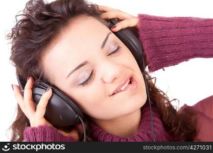 Young woman listening to music - isolated
