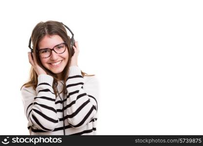 Young woman listening to music, isolated over white