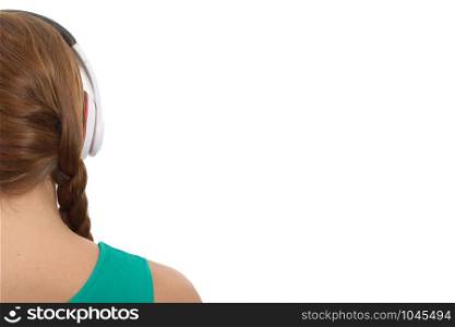 young woman listenning music with headphone, back view, isolated on white