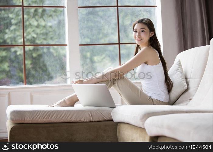 Young woman living at home