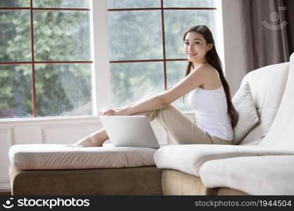 Young woman living at home